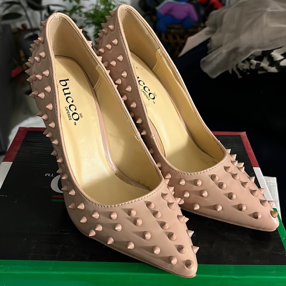 Blush pink spiked heels